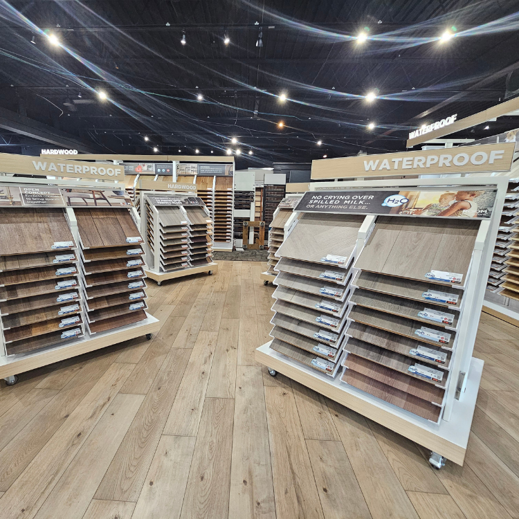 Bedroom with new oak hardwood flooring from Flooring America