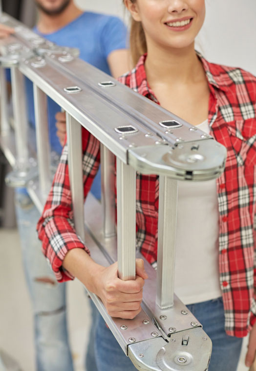 Woman holding a ladder